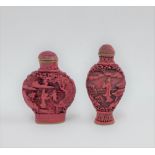 Two red cinnabar snuff bottles and covers, tallest 20cm (2)