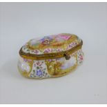 A Continental porcelain snuff / patch box and cover with gilt metal mounts, 9 x 4.5cm