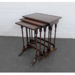 Mahogany nest of three tables on twin turned supports, 57 x 51 x 33cm (3)