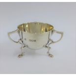 Edwardian miniature silver bowl, with three loop handles and hoof feet, London 1906, 5cm high