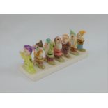 A Walt Disney's Classic Snow White and the Seven Dwarves novelty toastrack, 20cm long