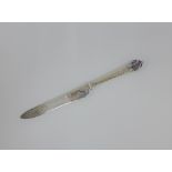 Omar Ramsden & Alwyn Carr silver knife, the terminal containing a purple hardstone, London 1907,