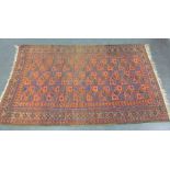 Eastern rug with rust field and flowerhead borders, 120 x 205cm