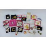 A quantity of boxed costume jewellery to include Butler & Wilson, Ivana Trump,Swarovski and Joan
