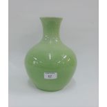 Chinese celadon glazed baluster vase with incised floral pattern, 25cm high