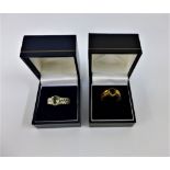 9 carat gold gemset dress ring together with a silver and yellow beryl set dress ring (2)