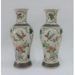 Pair of Chinese high shouldered baluster vases with bird and branch pattern to a craquelure ground