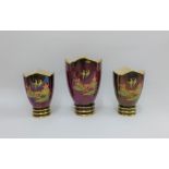 A garniture of Carlton Ware Rouge Royale Pagoda patterned vases, tallest 18cm (3)