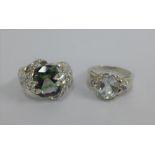 Two 9 carat white gold topaz set dress rings (2)