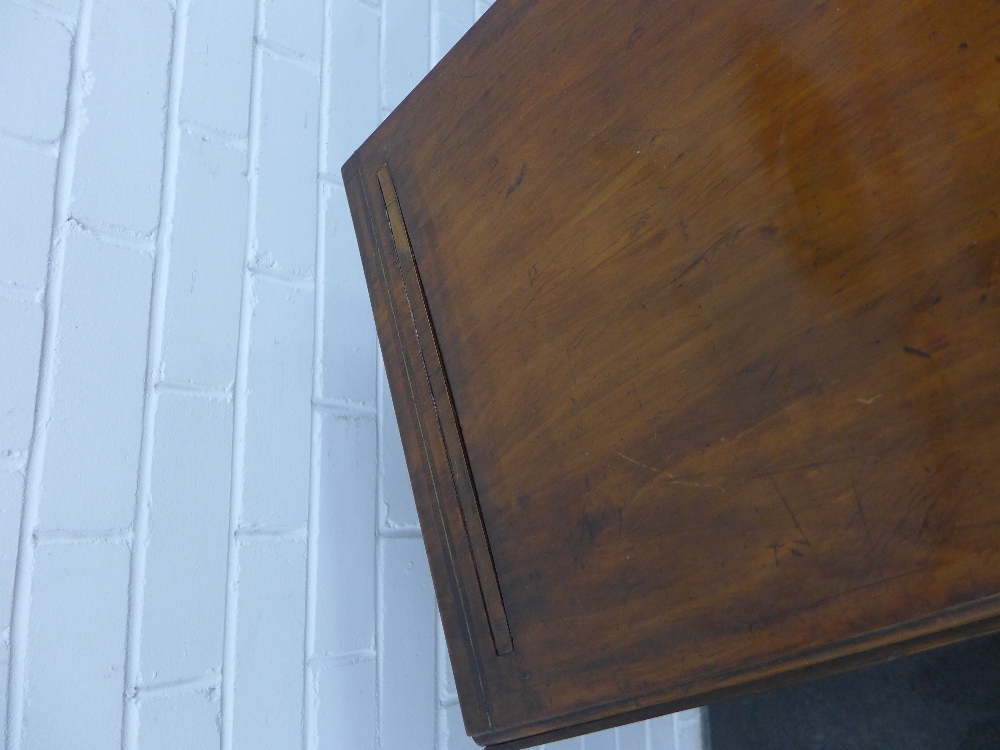 A mahogany table, the rectangular table with drop flaps, two frieze drawers and two dummy drawers, - Image 6 of 6