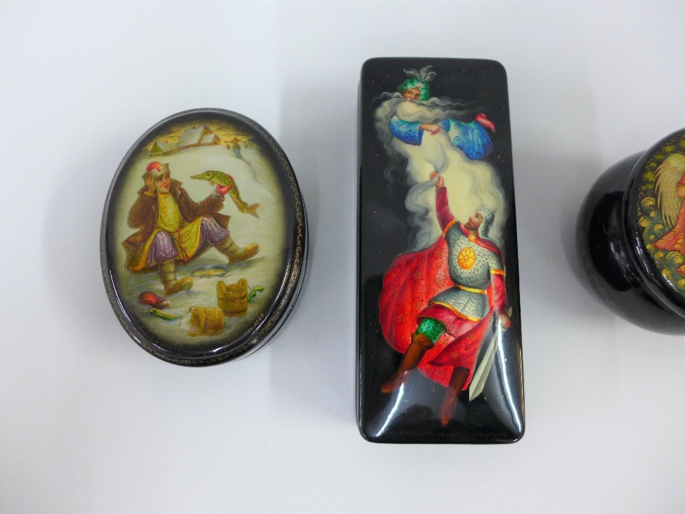A collection of three Russian black lacquered boxes with painted lids, largest 13cm long (3) - Image 2 of 3