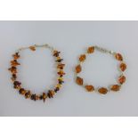 Two silver and amber bracelets (2)