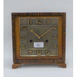 Art Deco style mantel clock, the square metal dial with Arabic numerals, 22 x 22cm