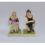 A pair of Staffordshire figures cobbler Jobson and his wife Nell, on square gilt lined bases, 17cm