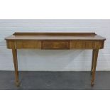Mahogany ledgeback hall / serving table with a single central frieze drawer, on square tapering legs