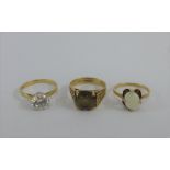 Two 9 carat gold gemset dress rings and a 14 carat gold dress ring (3)