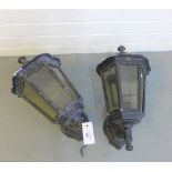 Pair of black painted cast aluminum and glass panelled lantern style wall lights, 45cm long (2)