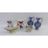 Masons style Imari jug, a pair of German stoneware ewers, Rouen faience miniature vase and two