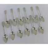 Twelve Scottish provincial silver fiddle pattern spoons to include ten with makers mark for James