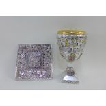 White metal 'Jerusalem' souvenir chalice, 14.5cm high together with a square stand, (2)