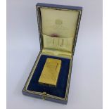 Gold plated Dunhill lighter in presentation box.