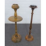 Two turned wooden ashtray stands, tallest 71cm (2)