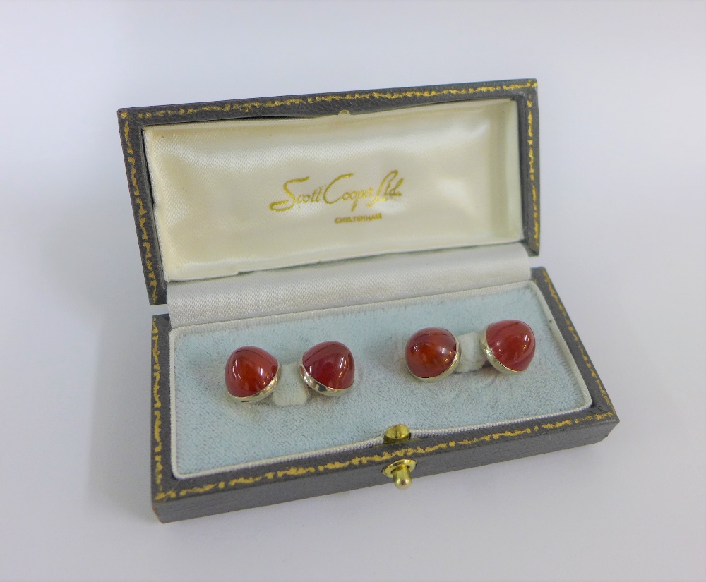 Gents carnelian cufflinks set in white metal which tests as 18 carat white gold, boxed