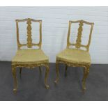 Pair of giltwood side chairs with foliate carved top rail and splat, upholstered seat and cabriole