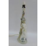 Nao porcelain figural table lamp base, 33cm high excluding fitting