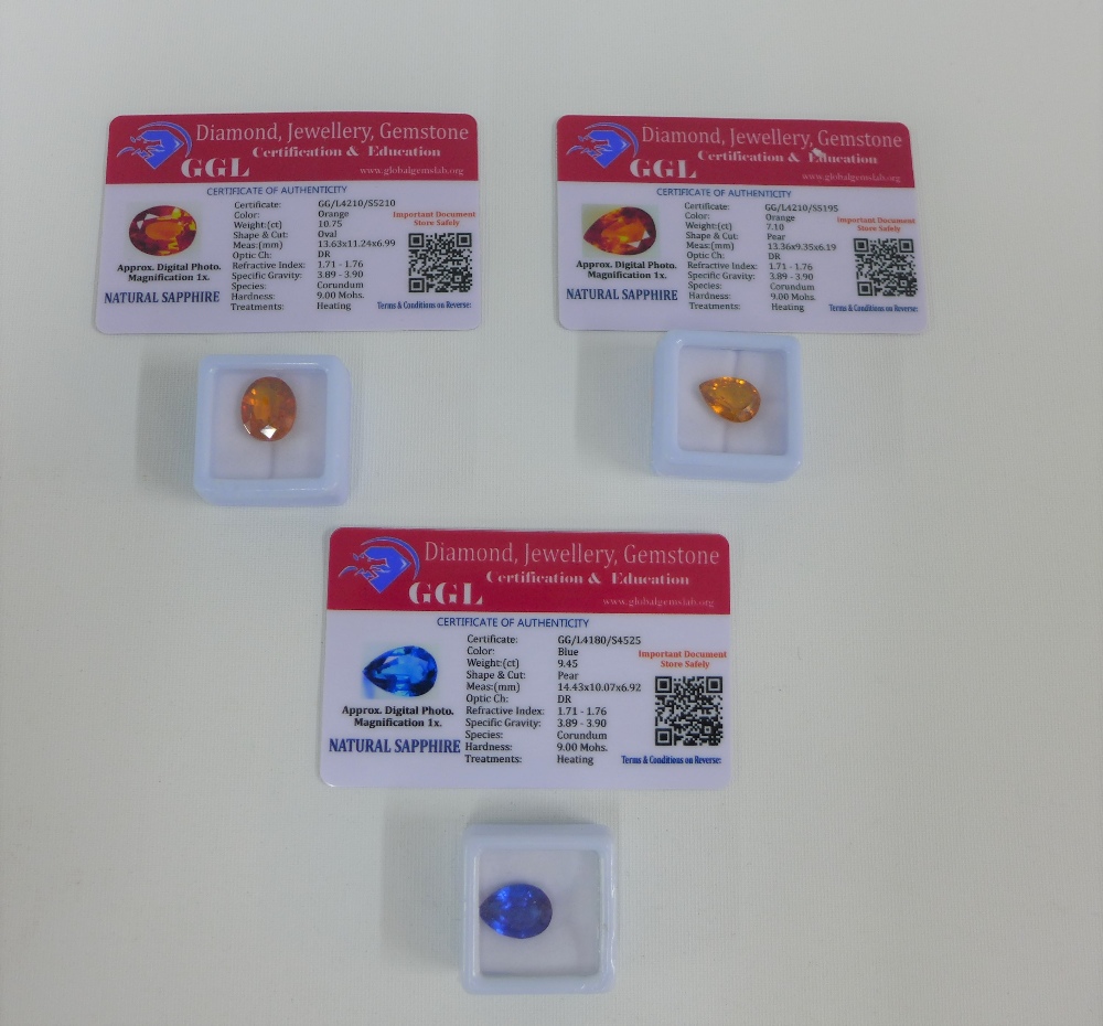 Three loose natural coloured sapphires, with certificates (3)