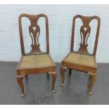 Pair of provincial splat back chairs each with a pierced heart motif and woven rush seat, raised
