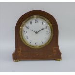 Early 20th century mahogany and inlaid mantle clock, the domed top over an enamel dial with Arabic