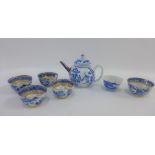 Chinese blue and white teapot with restored metal spout , 14cm high, together with a set of four