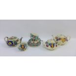 Scottish handpainted pottery table wares to include teapots, cups and saucers, etc (13)