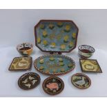 Collection of terracotta slip decorated table wares painted with ducks and chickens to include