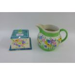 Bough Scottish pottery handpainted butter dish and cover together with a floral pattern jug, both