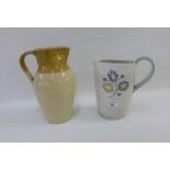 A Denby stoneware floral patterned jug and a Buchan pottery half gallon jug, tallest 27cm high (2)
