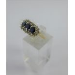 9 carat gold three stone sapphire and diamond dress ring, full 375 hallmarks UK ring size Q