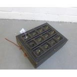 Architectural salvage iron light switch bank