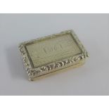Victorian silver vinaigrette, the hinged lid opening to reveal a gilt interior with pierced grill,
