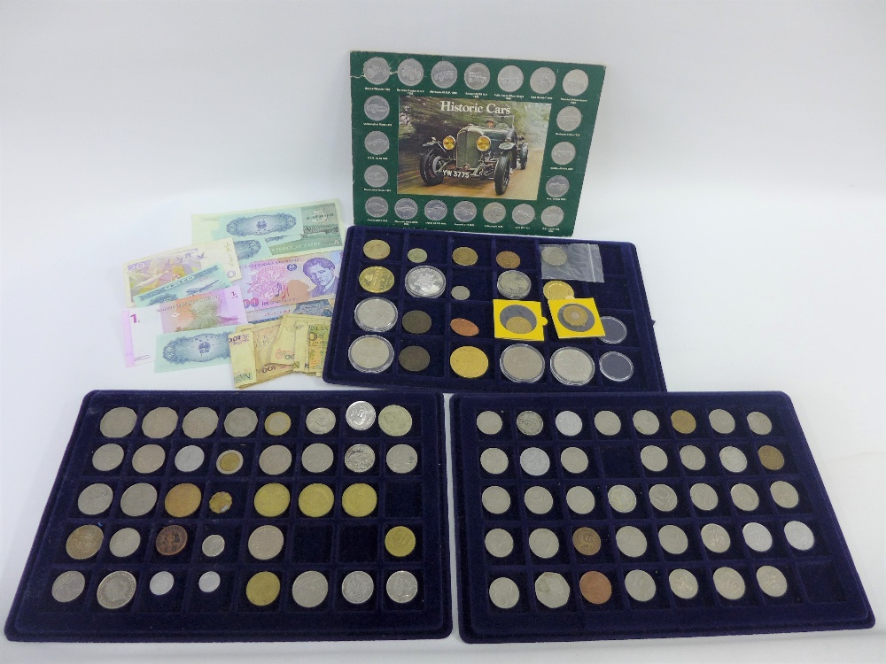 A case containing miscellaneous commemorative coins, etc (a lot)