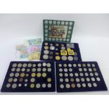 A case containing miscellaneous commemorative coins, etc (a lot)