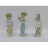 Collection of three Lladro girl and boy figures, all with printed backstamps, tallest 25cm (3)