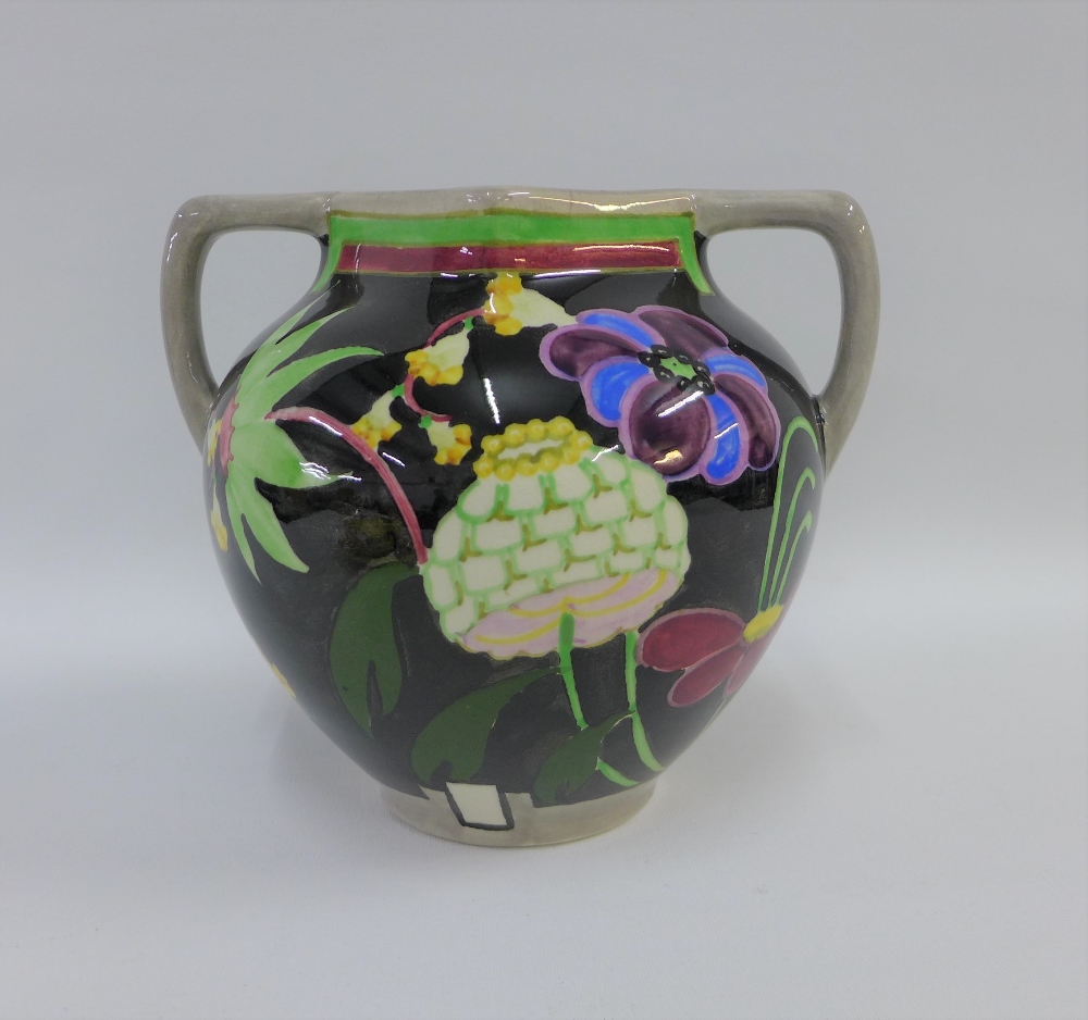 Bough Scottish pottery twin handled vase hand painted with stylised flowers to a black ground,