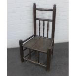 Provincial dark wood chair with spindle back and solid seat, 90 x 52cm