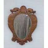 Early 20th century oak wall mirror with carved swan frame, 72 x 58cm