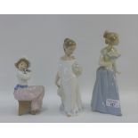 Three Nao porcelain figurines, tallest 23cm (3)