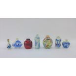 Collection of Chinese snuff bottles to include five blue and white, one red hardstone and one