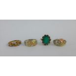 9 carat gold dress ring together with an unmarked 9 carat gold ring with green claw set stone and