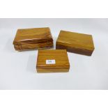 A collection of three fruitwood boxes, largest 21cm long (3)